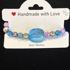 Colorful Beaded Bracelet with Blue Accent multicolor millefiori style beads.